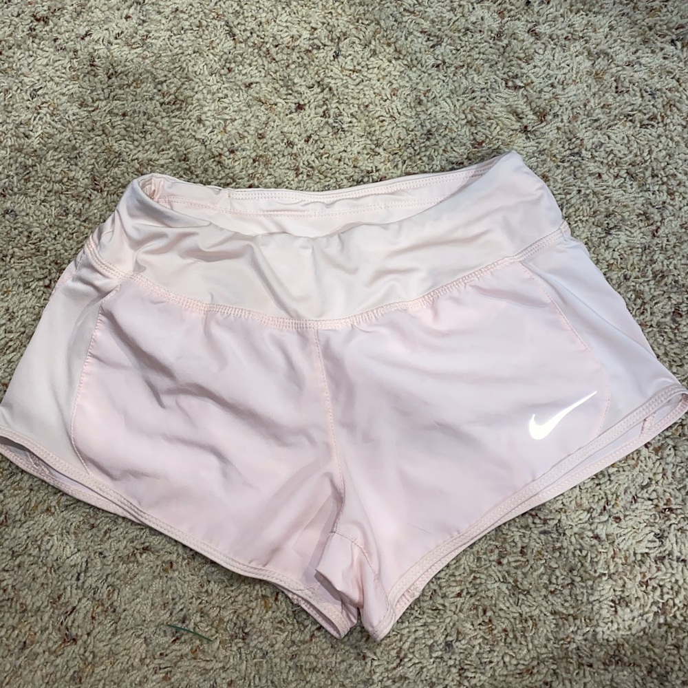 Light pink Nike shorts